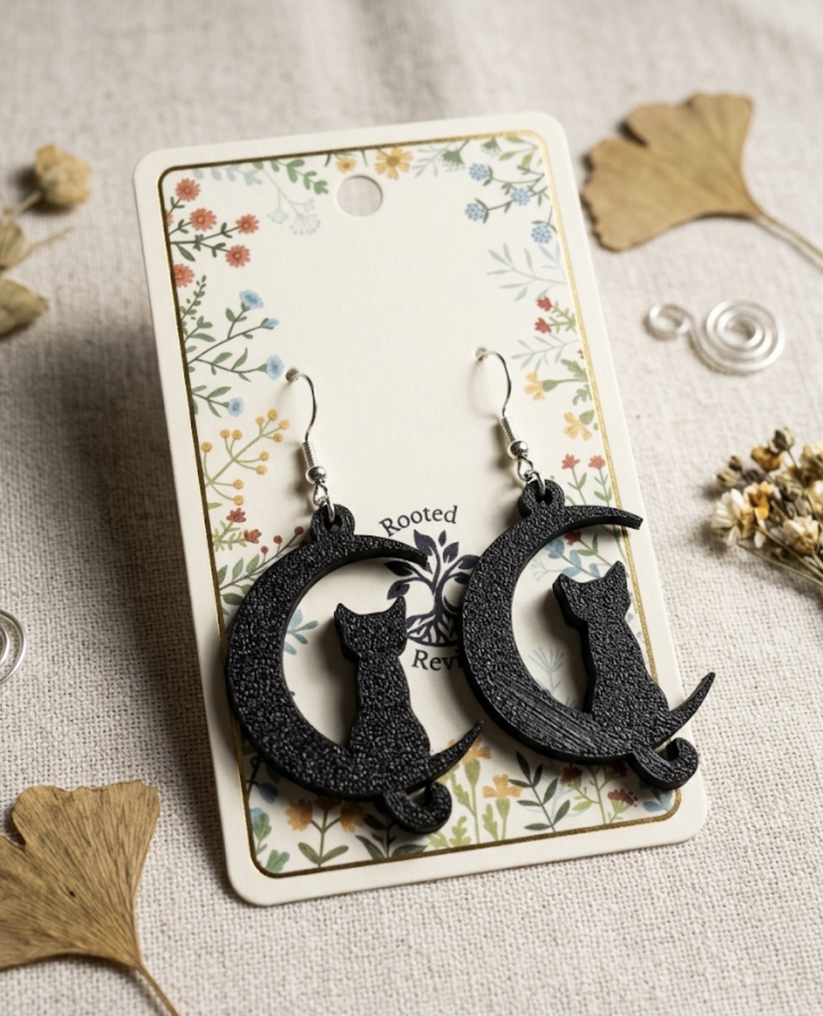 cat in moon earrings